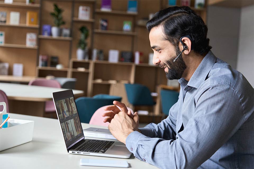 man working on laptop computer