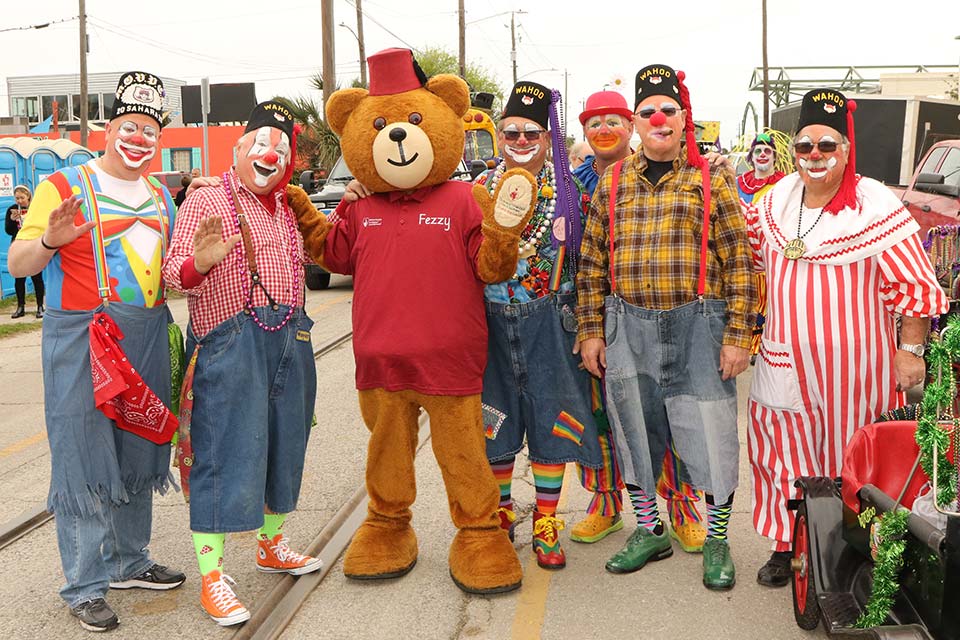 Shriners dressed as clowns during Mardi Gras event